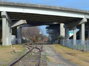 The SC Railroad tracks passing beneath an overpass of Interstate 26