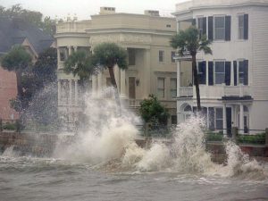 Storm surge waves crashing over East Battery Street