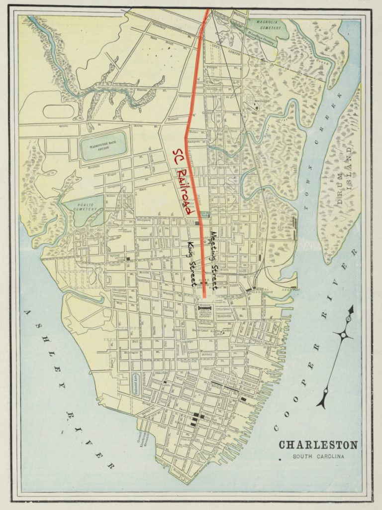 A map of Charleston from 1901 overlayed with the path of the South Carolina Railroad in red, its path running northward between Meeting Street and King Street